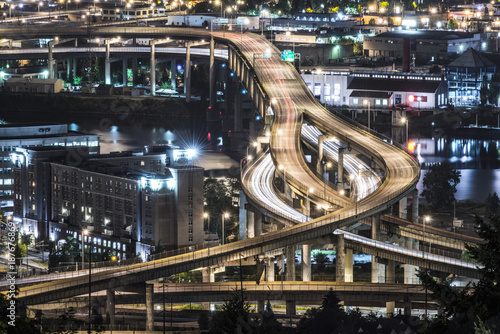 High angle view of elevated roads in city at night photo