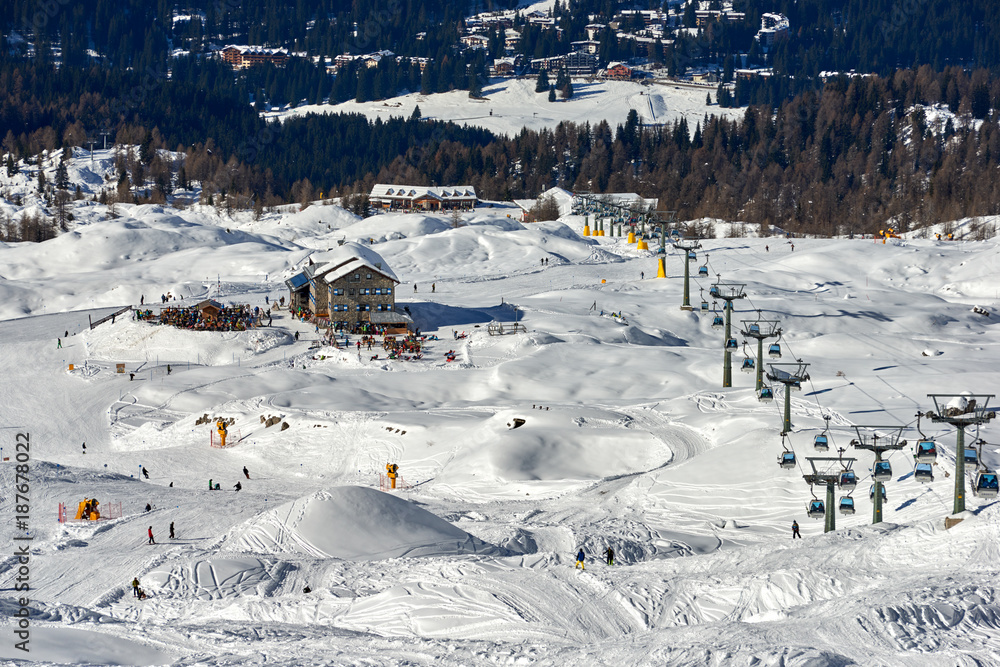 MADONNA DI CAMPIGLIO, ITALY-21 November 2014:Skiers on the Cable car to the Groste-pass, Madonna di Campiglio, skiers on slope in ski resort Italian Alps in sunny day in Madonna di Campiglio,italy