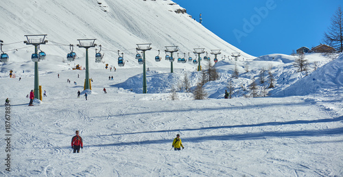 MADONNA DI CAMPIGLIO, ITALY-21 November 2014:Beautiful winter mountains landscape Ski lift Ski resort in italy, The ski slope and skiers at Passo Groste ski area