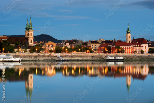 Buda side of Budapest city reflected in water