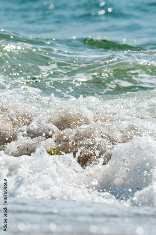 The vertical , side view of seashore in the ocean. Concept relax and travel. The vertical , side view of seashore in the ocean. Concept relax and travel.
