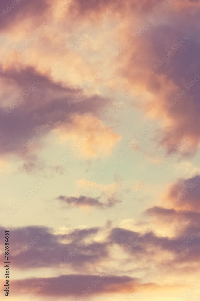 The vertical view of sky background or texture at the sunset time with clouds. Copy space The vertical view of sky background or texture at the sunset time with clouds. Copy space