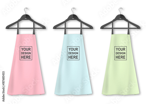 Vector cotton kitchen apron icon set with clothes hangers closeup isolated on white background. Pastel colors. Design template, mock up for branding, advertising etc. Cooking or baker concept