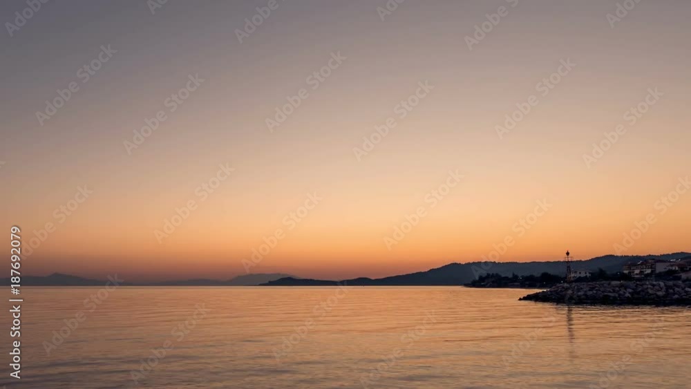 Sunset in Nea Skioni town, peninsula Kassandra, Greece. Time lapse of sunset on Aegean sea. Sunset in Nea Skioni town, peninsula Kassandra, Greece. Time lapse of sunset on Aegean sea.