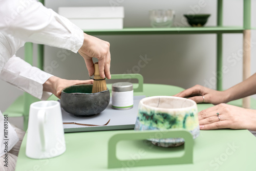 Making of green matcha tea