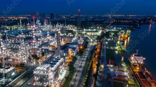 Aerial view of Oil and gas industry - refinery, Shot from drone of Oil refinery and Petrochemical plant at twilight, Bangkok, Thailand © Travel mania