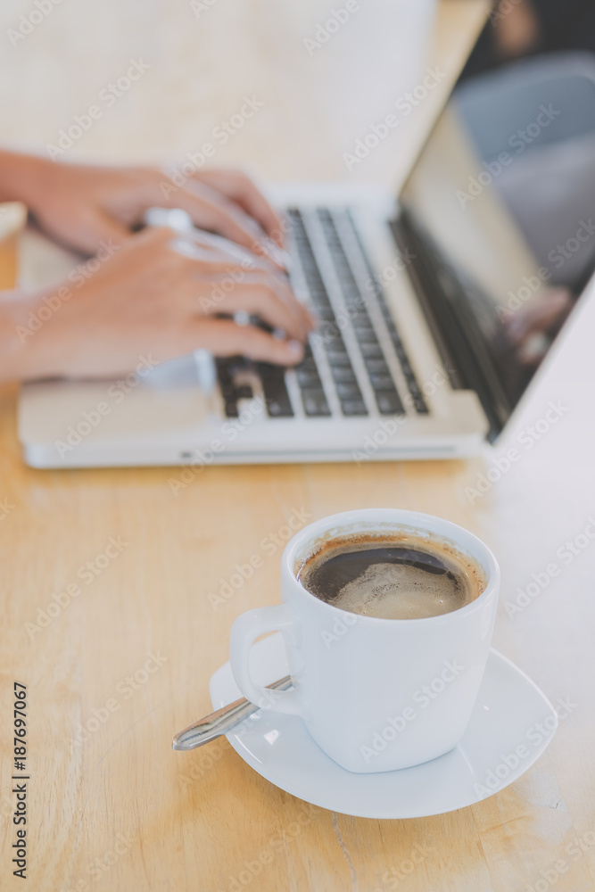 Cup of coffee on old wooden desk Cup of coffee on old wooden desk