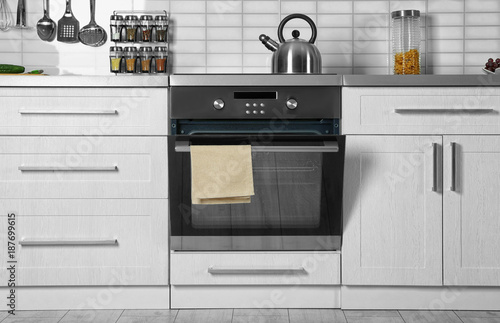 Fototapet Modern kitchen interior with new oven