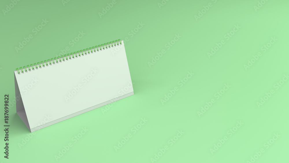 White table calendar mock-up on green surface White table calendar mock-up on green surface