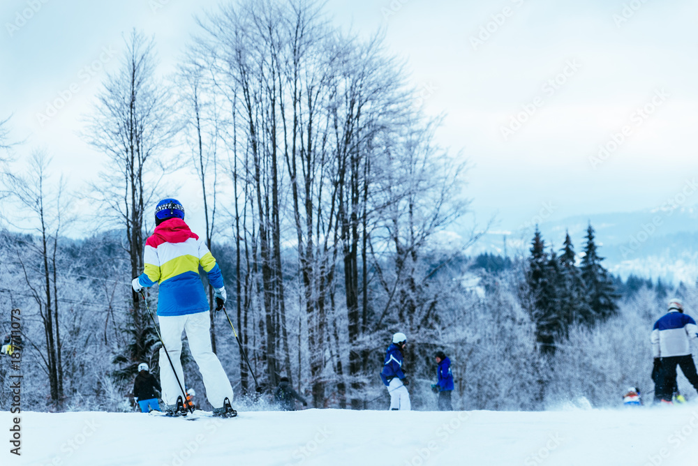 people skiing and snowboarding at winter  mountains