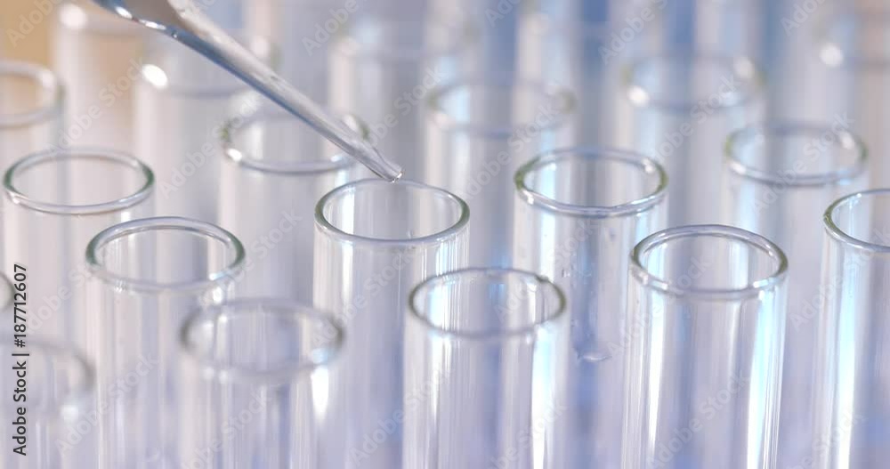 Test Tubes being filled Test Tubes being filled