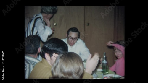 1968 Family Thanksgiving in wood paneled basement 