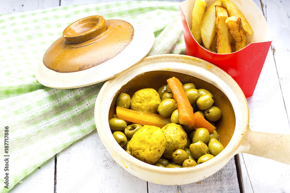 arabic tajine food of green olives with kufta and fried potato arabic tajine food of green olives with kufta and fried potato