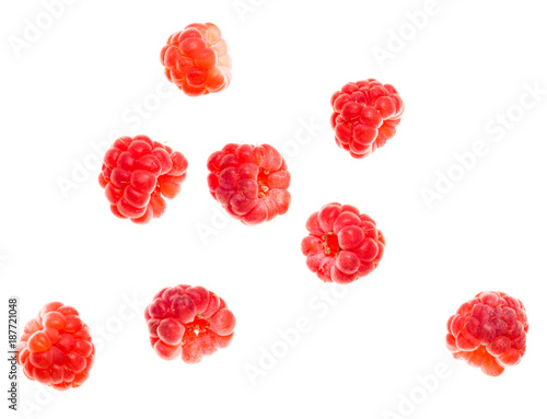 Schilderij op canvas Juicy red raspberries on white background