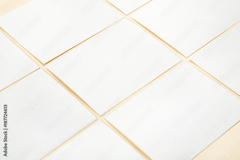 Blank white paper cards on a soft color background, business cards mockup