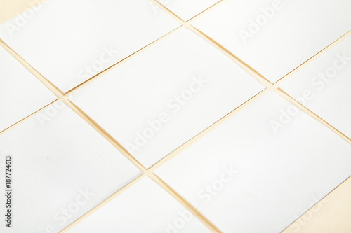 Obraz na płótnie Blank white paper cards on a soft color background, business cards mockup w salonie