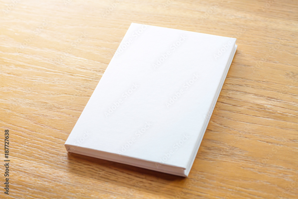 Blank catalog, magazines,book mock up on wood background Blank catalog, magazines,book mock up on wood background