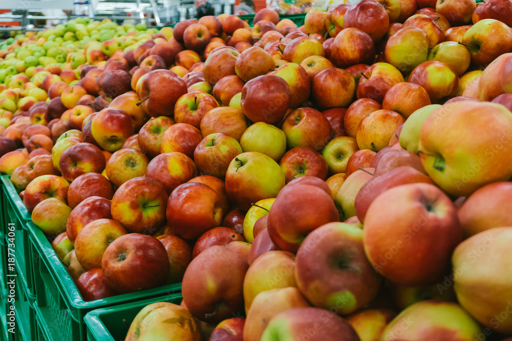 Apples on supermarket shelves