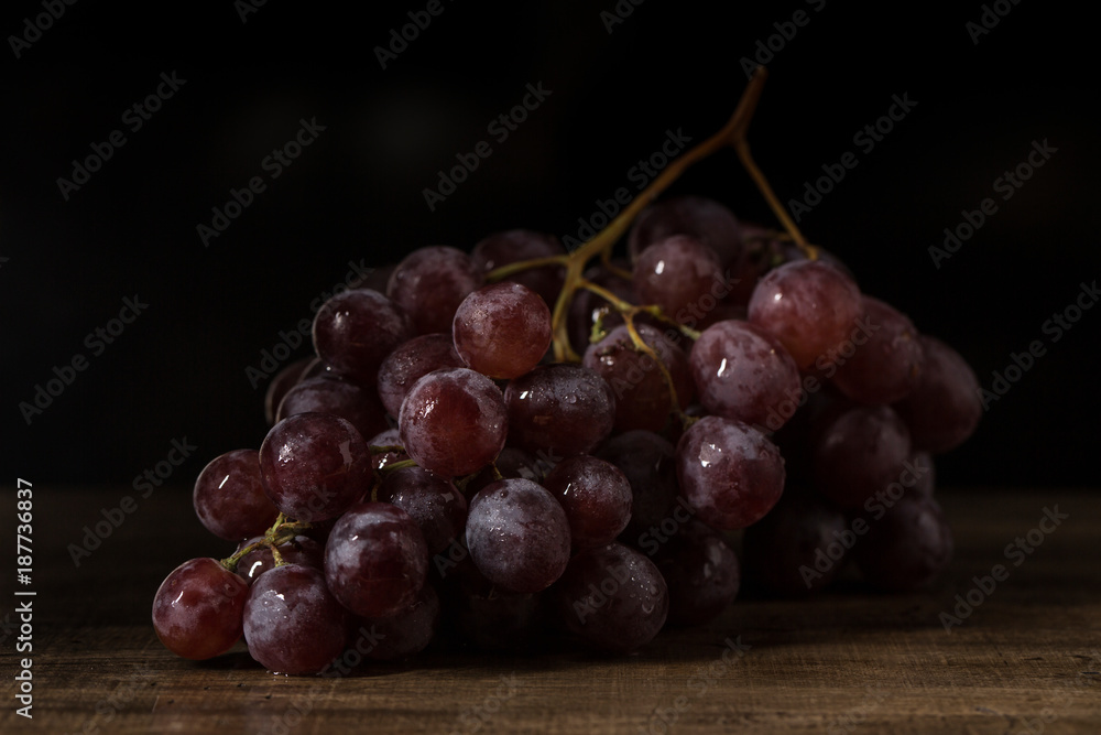Fresh red grapes, vintage style.