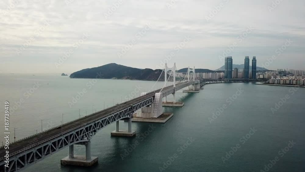 Gwangan Bridge and Haeundae aerial view at Sunrise, Busan, South Korea. Gwangan Bridge and Haeundae aerial view at Sunrise, Busan, South Korea.