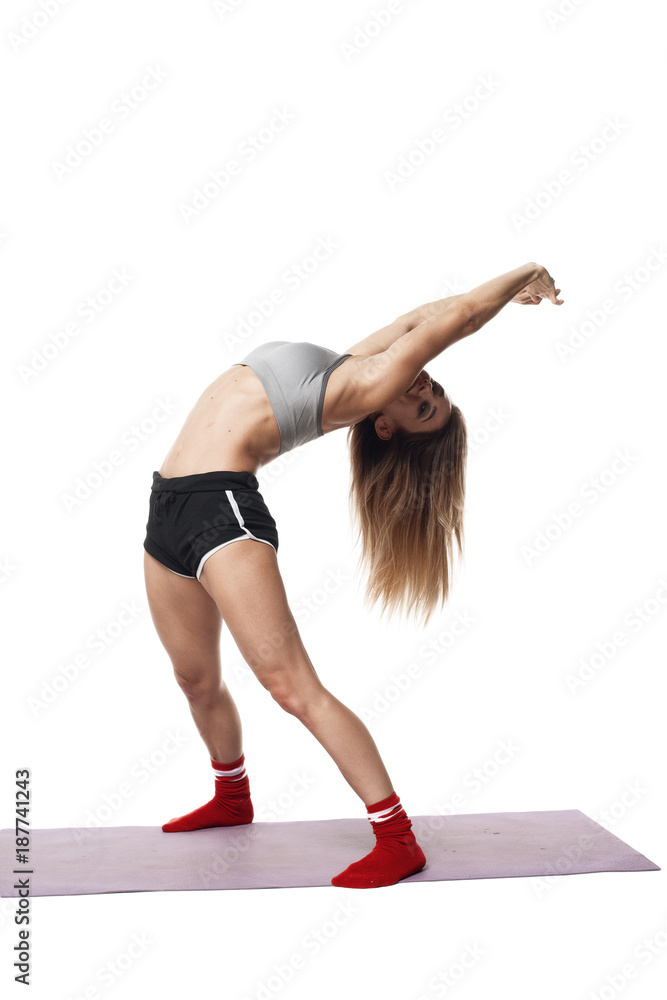 Fitness beautiful girl made stretch on white background isolated Fitness beautiful girl made stretch on white background isolated