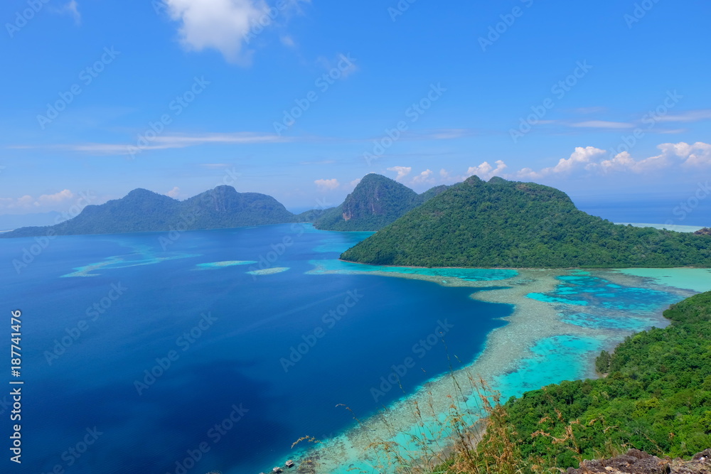 The majestic view of corals reef and islands seen from the top of mountain at Bohey Dulang Island, Sabah, Malaysia.