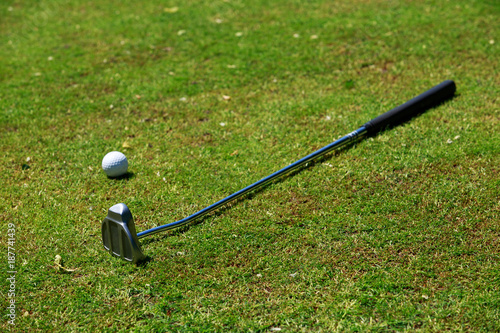 golf-stick and ball