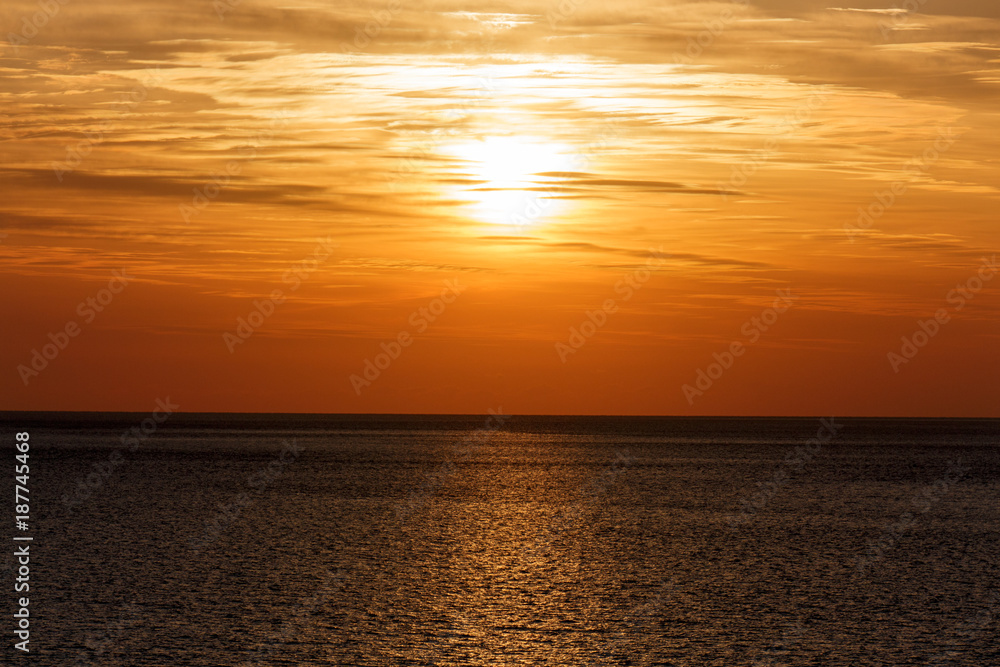 Fototapeta premium Beautiful sunset above the sea. Sunset Sky.