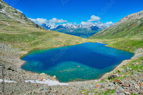 Fototapeta Naklejka Na Ścianę i Meble -  lLake Languard small alpine lake in the Rhaetian Alps in the Engadine valley