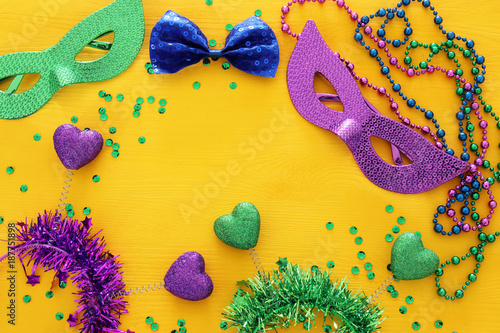 Top view image of masquerade background. Flat lay. Mardi Gras celebration concept.