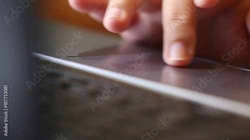 Hands Typing using touch screen on laptop closeup, chatting in Social media via Facebook or meeting website, Blogger journalist writing new article online on computer