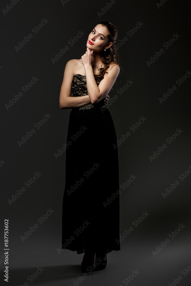 beautiful curly woman in black dress beautiful curly woman in black dress
