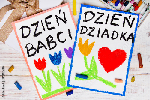 Polish Grandfather's Day and Grandmother' Day card. Colorful hand drawing, crayons and gift box.