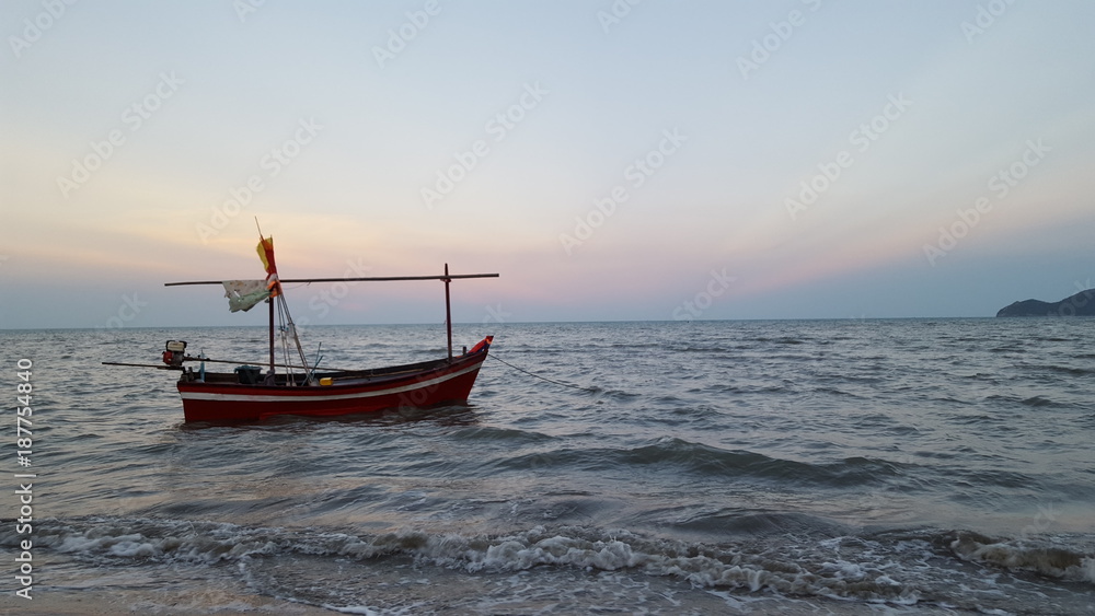 Fototapeta premium The fishery boat floating on the sea