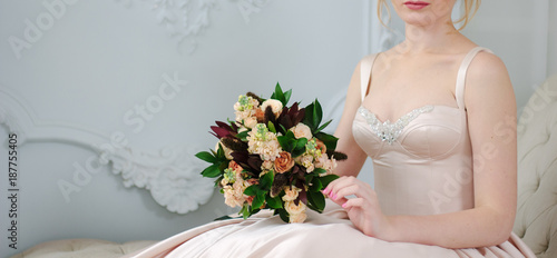 Woman in beautiful dress ho...