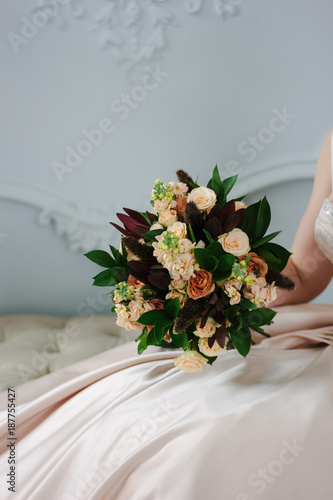 Woman in beautiful dress ho...