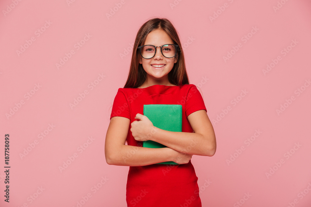 Cheerful girl nerd holding books and looking camera isolated Cheerful girl nerd holding books and looking camera isolated
