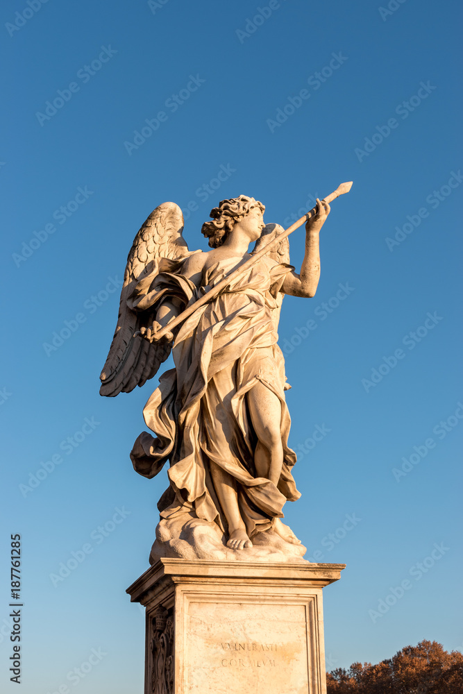  Marble statue of angel with spear. Saint Angelo Bridge in Rome. Italy.