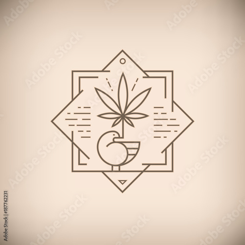 Bird with marijuana leaf brown emblem