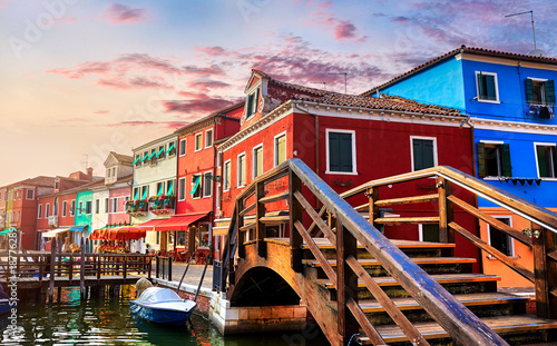 Burano island in Venice Italy picturesque sunset over canal © Yasonya