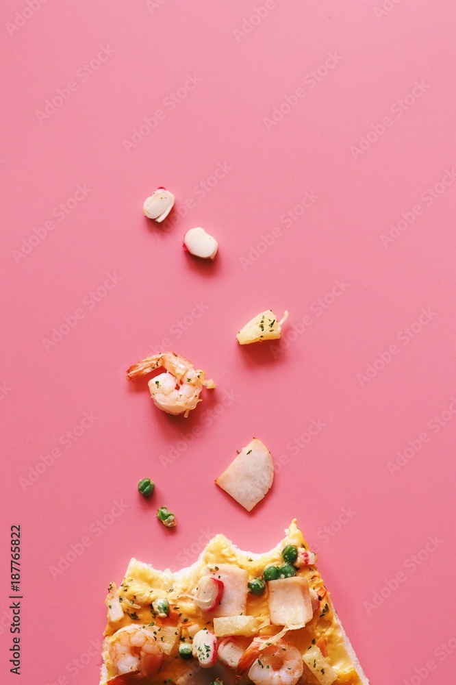 Close up delicious of seafood pizza over pink background. Close up delicious of seafood pizza over pink background.