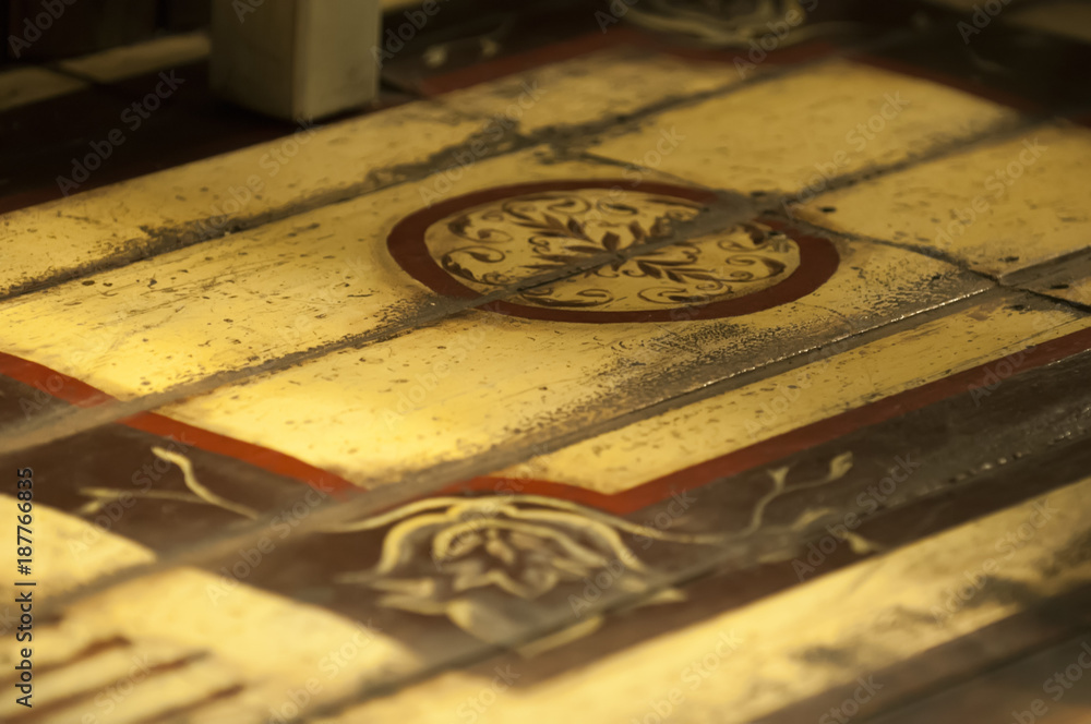 A fragment of a wooden floor with A fragment of a wooden floor with