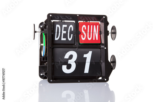 The mechanical calendar retro date 31 December, 2017 on a white background.