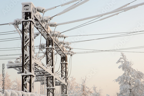Glass insulator on the power line. Insulator of electrical high-voltage lines