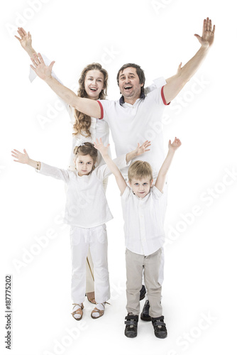 concept of family victory: a portrait of the triumphant family with gesture of hands up