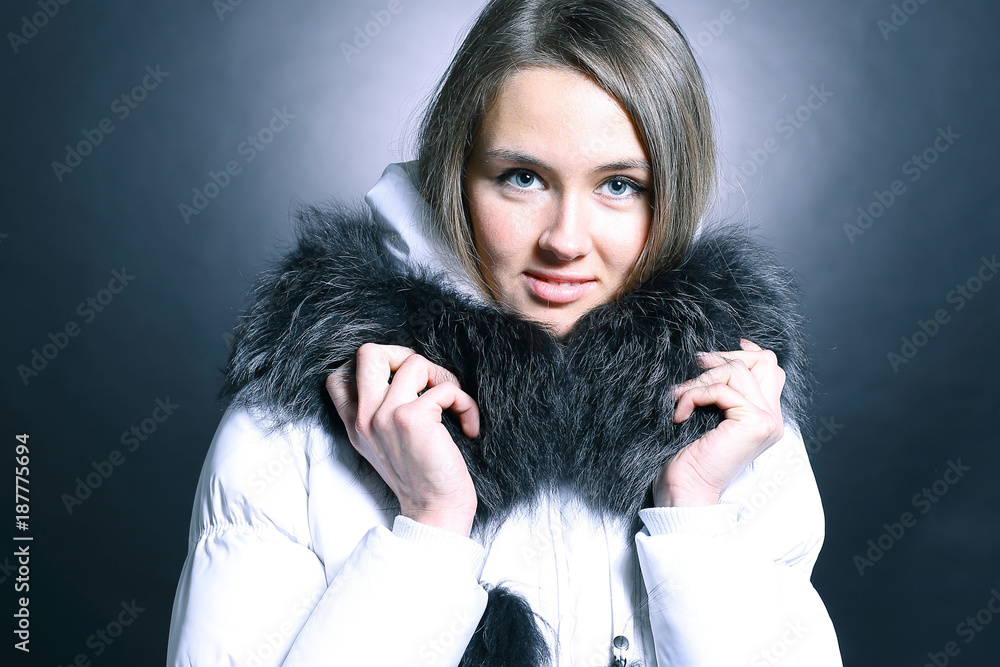 portrait of beautiful young woman in winter jacket portrait of beautiful young woman in winter jacket