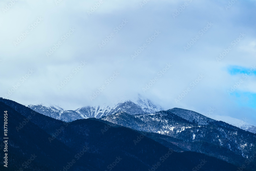 Mountain snow peak, beautiful natural winter backdrop. Ice top of the hill, blue sky background. Alpine landscape. Mountain snow peak, beautiful natural winter backdrop. Ice top of the hill, blue sky background. Alpine landscape.