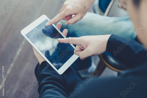 Businessman use computer tablet for work in communication around worldwide to success marketing plan of company
