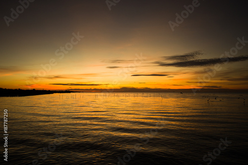 Beautiful of cloud and sky with reflection over sea at sunset at sunrise