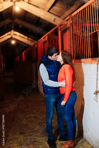 young couple in a Russian village with horses, riding © ShevarevAlex